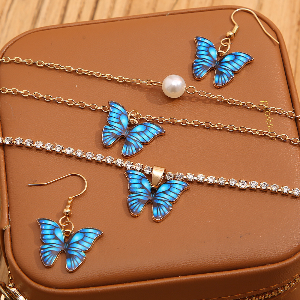 Cute Butterfly Chain Charms Pearl Earring Set