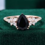 Pear Shaped Black Onyx Engagement Ring Nature Inspired Blossom Side Stone Ring