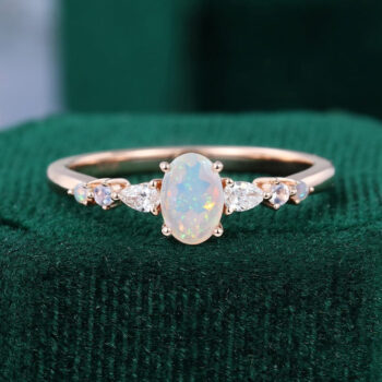 Asteria | Oval Cut Facet Opal Dainty Engagement Ring with Trio Side Stones