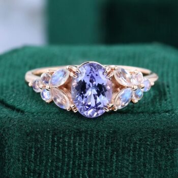 Oval Cut Tanzanite Engagement Ring with Moonstone Blossom